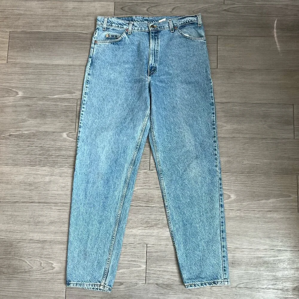 90s Levi’s 550s Relaxed Fit Tapered Leg Orange Tab Light Wash Jeans Sz 38X34